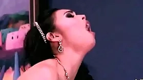 Sexually aroused Asian woman with large breasts, Tera Patrick, gives a satisfying oral sex performance