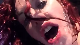 Redhead pornstar Ana Nova competes for a portion of a penis