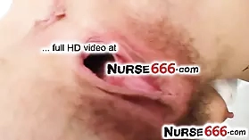 Amanda Vamp, a seductive nurse, uses a speculum to spread her vagina for pleasure